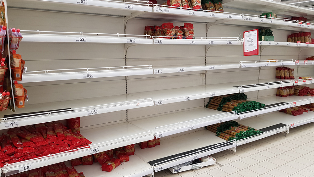 Photograph empty shelves in supermarket because of Covid-19