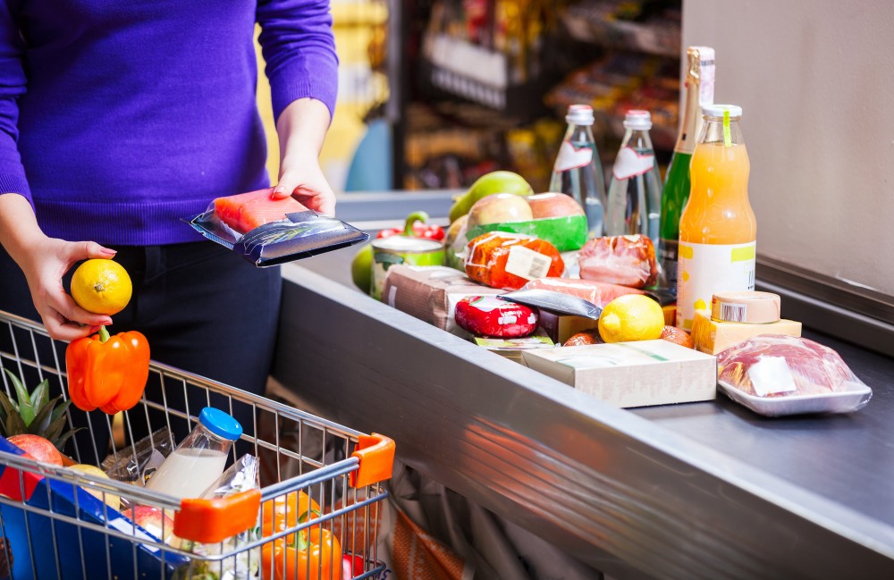 Person choosing food in a supermarket